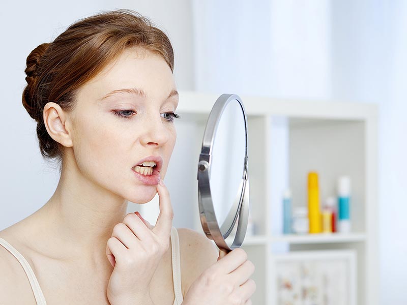¿Cuáles son los síntomas más comunes de una enfermedad periodontal?